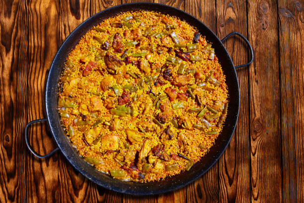 receta de paella de ternera y champiñones